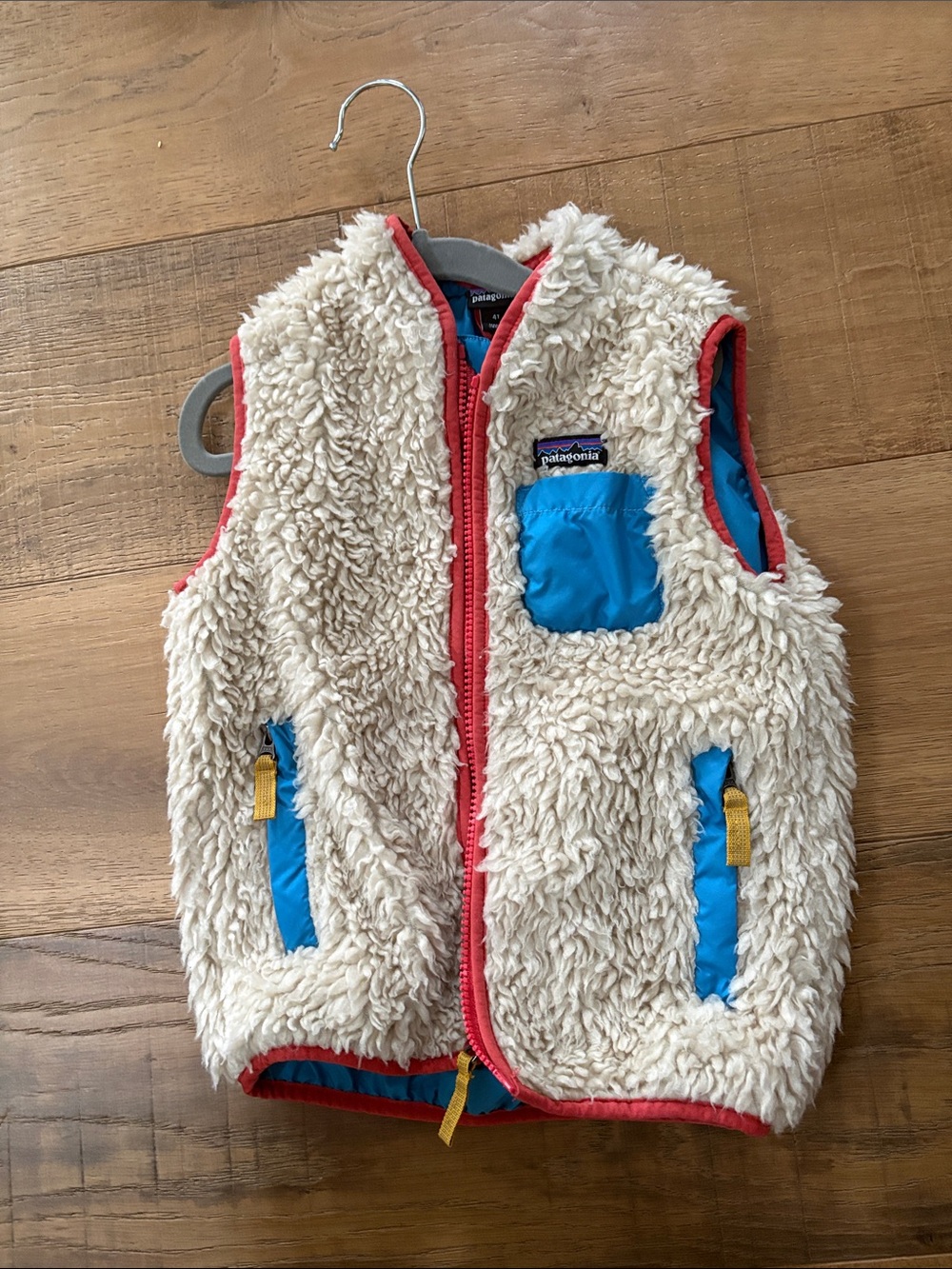 Patagonia Cream Sherpa Vest with Bright Blue Pockets and Coral Trim Size 4T